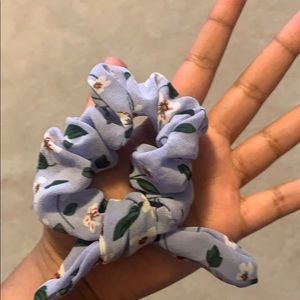 light blue scrunchie with floral design